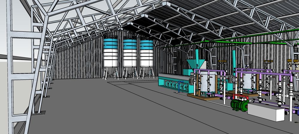 Interior con silos y líneas de producción